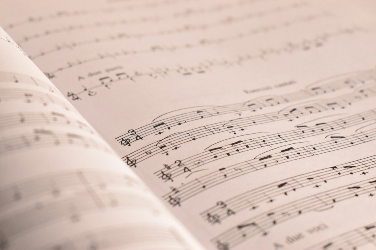 A score lying open, its pages softly lit